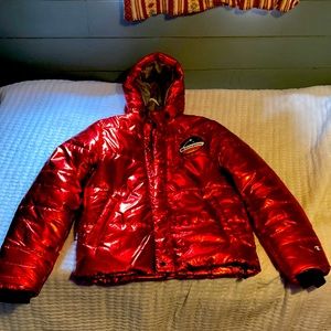 Champion puffer jacket red s small has patches, zip up and button